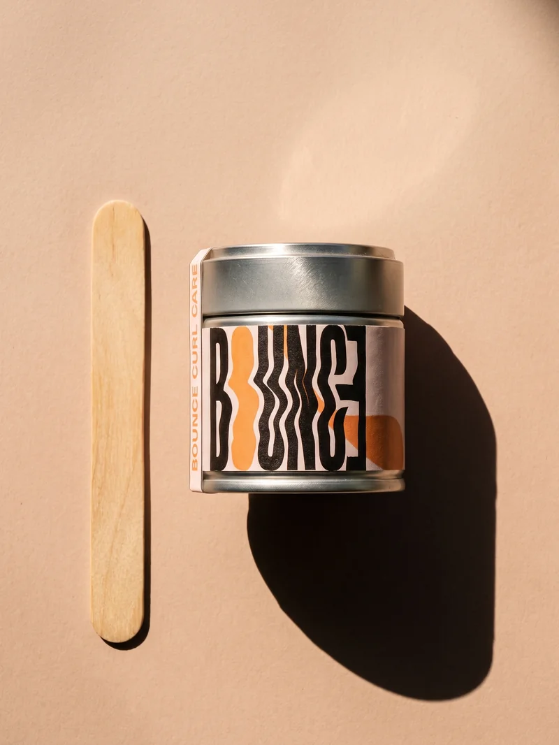 A Bounce tin in dramatic top-down light